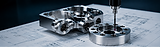 Precision machined component undergoing dimensional inspection
