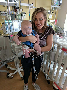 mary sarah holding nicu baby