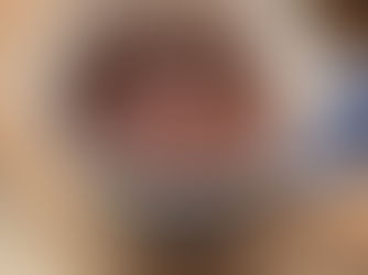 Chocolate mug cake freshly cooked in a microwave-safe mug, showing a soft, fudgy texture.