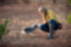 sarah surrit dog trainer with dog in field