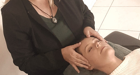 Julie undertaking a Facial Acupuncture Message in her Toowoomba clinic.