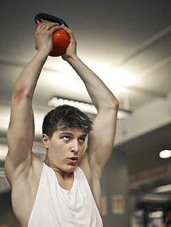 young-man-trains-gym.jpg