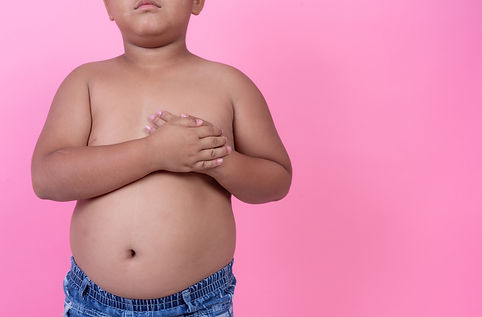 obese-boy-who-is-overweight-pink-background.jpg