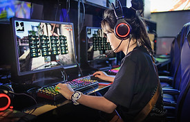 Young Girl Playing Computer Games