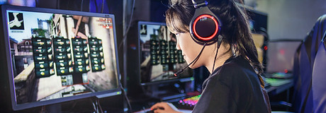 Young Girl Playing Computer Games