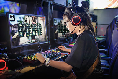 Young Girl Playing Computer Games
