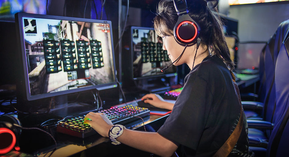 Young Girl Playing Computer Games