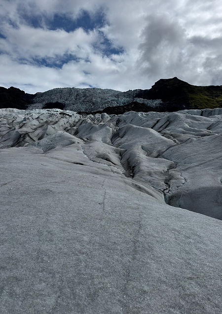 Vast icy landscape of Vatnajökull National Park with Europe’s largest glacier, showcasing rugged glacial plains, volcanic mou