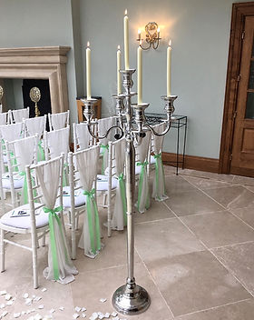 Floor standing silver candelabras