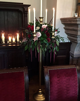 Floor standing gold candelabras