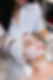beautician-with-brush-applies-white-moisturizing-mask-face-young-girl-client-spa-beauty-sa