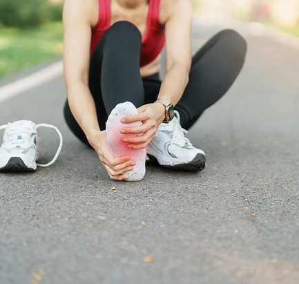 woman suffering from a foot sports injury