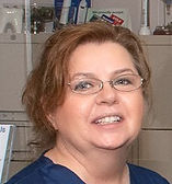 Laurie splits her time between assisting and front desk