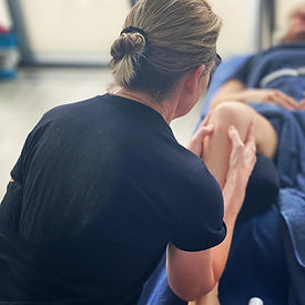 Massage Tiverton treating a knee running injury_edited.jpg