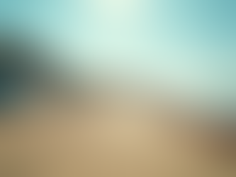 Coastal town with vibrant beach huts and sandy shore