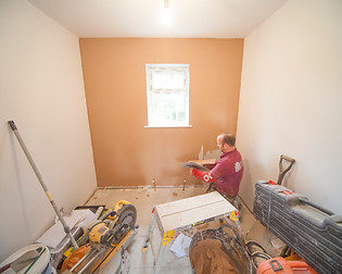 builder plastering a house renovation in frimley near camberley