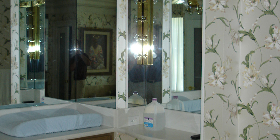 Original vanity area before luxury bathroom upgrade by CHI Construction