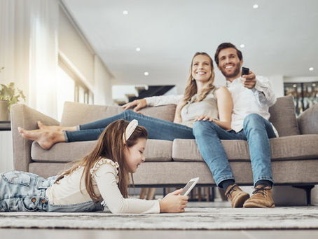 A family enjoying a decluttered life at home because they rented an affordable self storage unit at Hometown Storage in Oakwood Georgia near Gainesville
