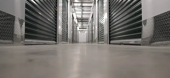 Interior self storage doors that are white on climate controlled storage units