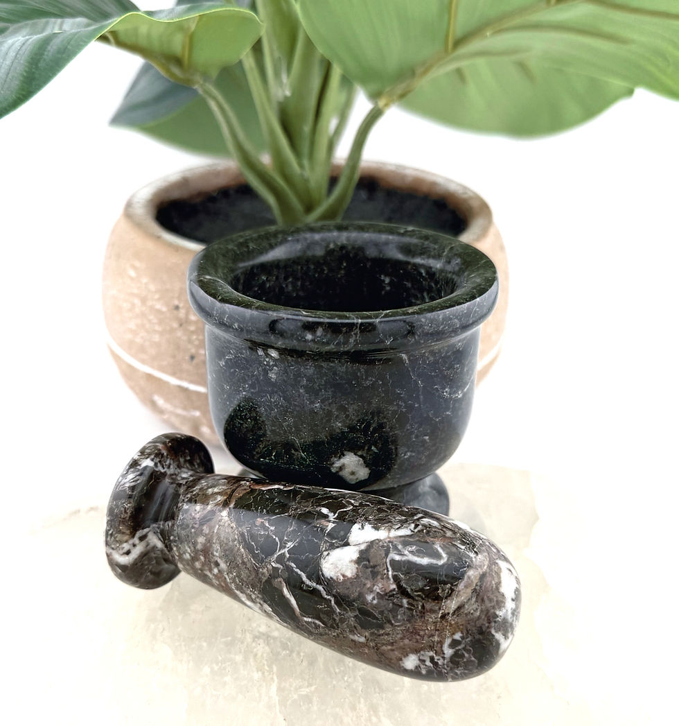 Very dark green stone mortar and pestle