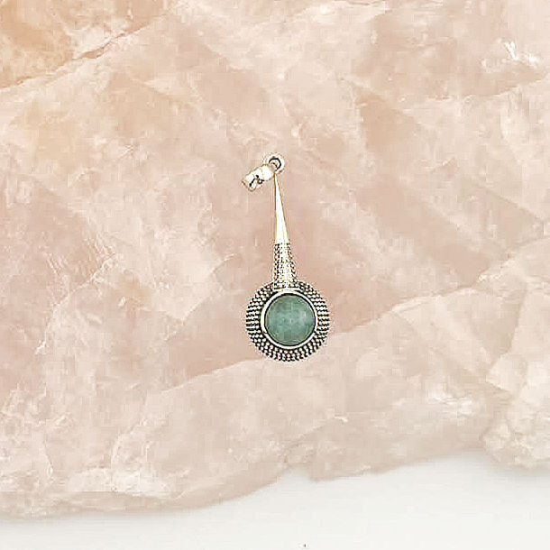 Thumbnail: Silver pendant with long shaft and a round setting with a light aqua stone.