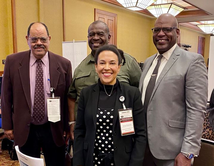Event photo of L-R: Sherman Garnet from Sherman Garnett & Associates, Earl Smith from Apple Valley USD, Erica Peterson from SI&A and Don English from San Bernardino County Superintendent of Schools.