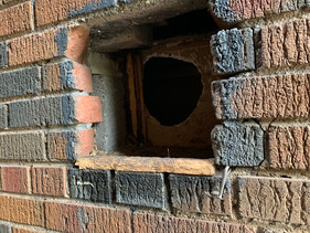 Squirrel Entry Hole In Wall Of Home In York, ON