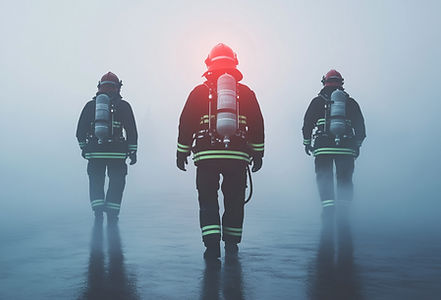 silhouette of firefighters, after extinguishing the fire, carrying out fire extinguishing 