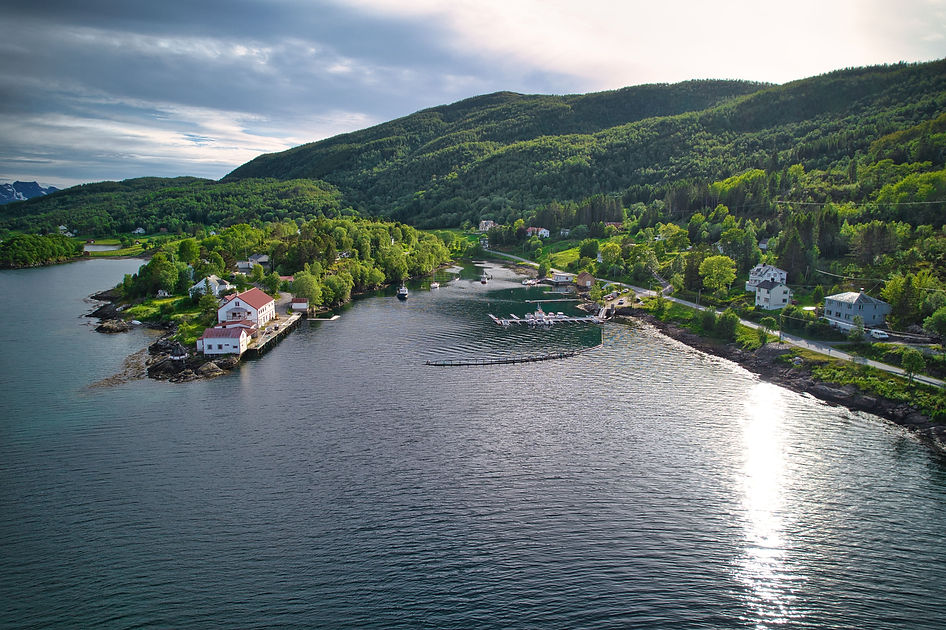 Panoramic view of Dyrøya cliffs and fjords from luxury yacht