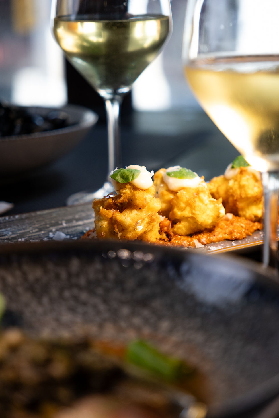 Gourmet appetizers and wine at a luxury villa near Barcelona