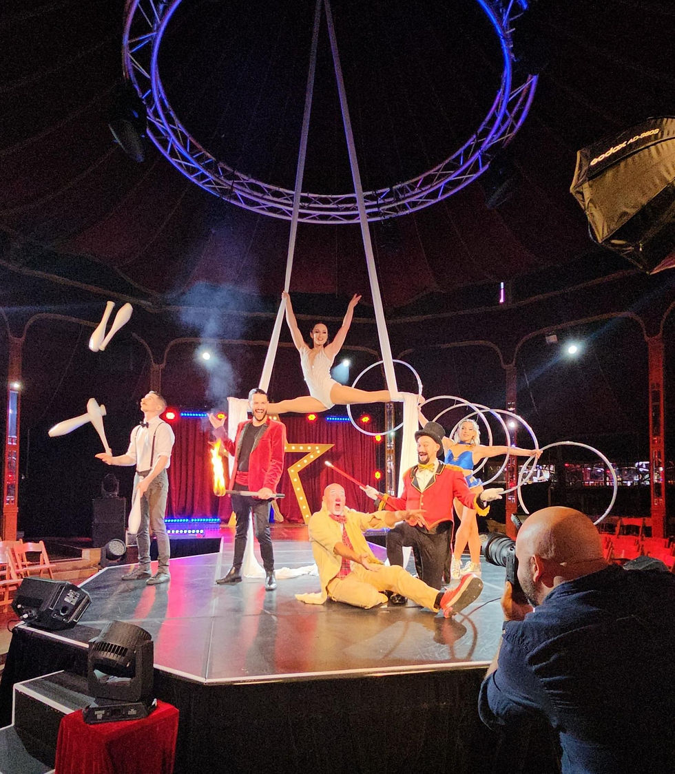 Circus cast performing aerial and juggling acts on stage, premium live entertainment for corporate events and gala shows