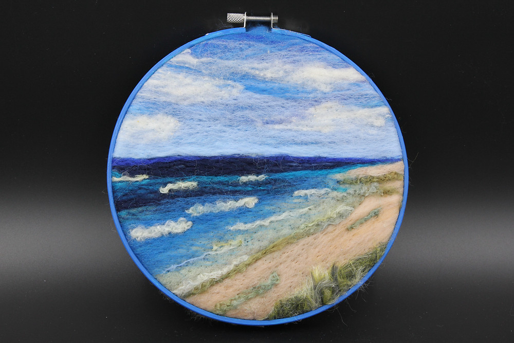 Needlefelt wool framed in 6" embroidery hoop