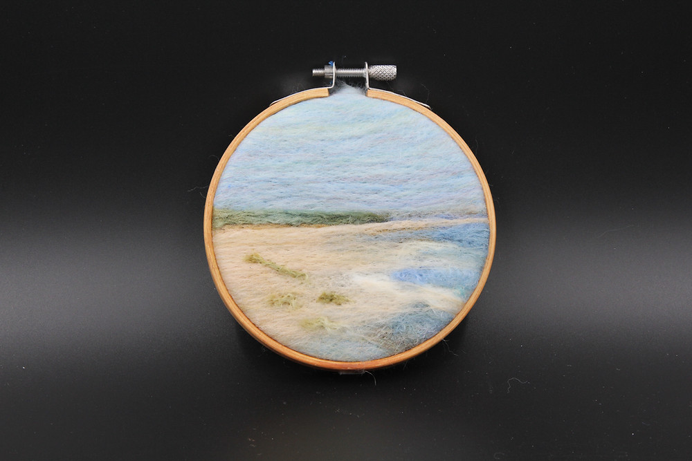 Needlefelt wool framed in 4" embroidery hoop