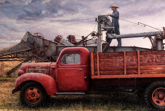 old truck with thresher farming
