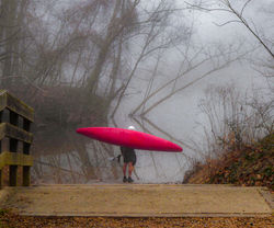 22. Reedy Creek kayak put-in. A kayaker in the fog.