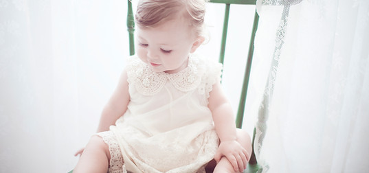 Child in Green Chair
