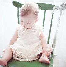Kind in Green Chair