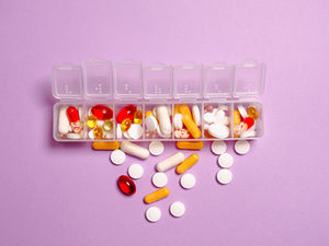 Prescription antibiotics and a glass of water