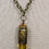Thumbnail: Amber Bullet Casing Necklace