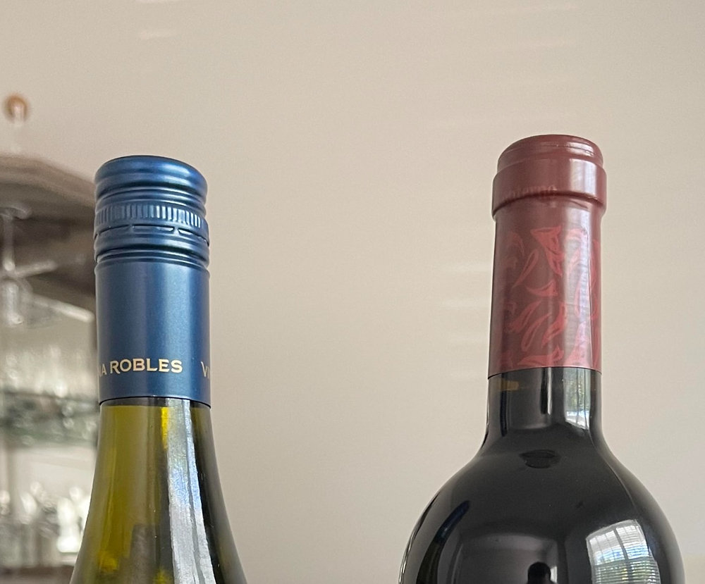 Exploring the Pros and Cons of Screw Caps and Corks for Wine