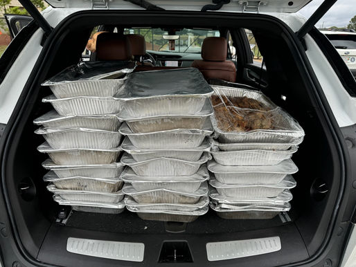 Braving the Storm: Volunteers Deliver Meals to Downtown Rescue Mission at South Star Music Fest