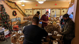 What do jars of peanut butter, boxes of oatmeal, and canned goods all mean on New Years Day?