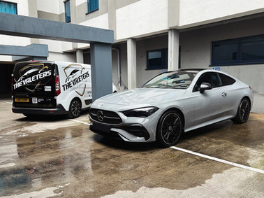 Silver Mercedes parked after valet