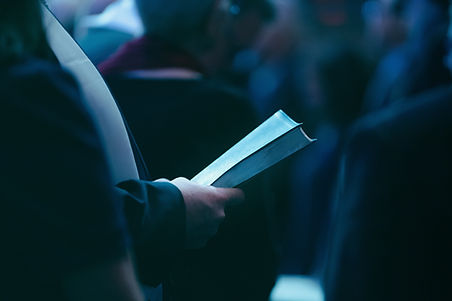 Photo of someone holding a bible