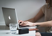 Canva - Woman Using Silver Macbook Near