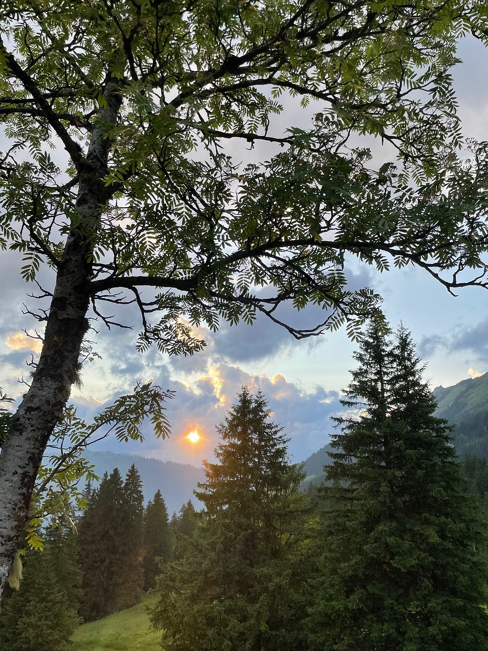 sun shining through the cloud