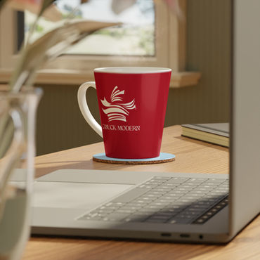 Canuck Modern logo on red latte coffee mug