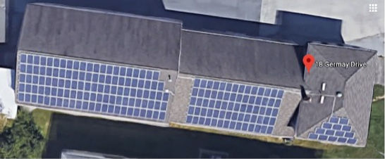 Photo of roof of building showing solar array