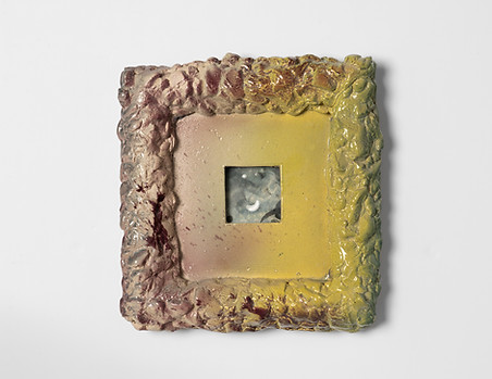 Ceramic frame sculpture with rough stone texture and dreamlike gradients, enclosing a night scene with a star and moon.