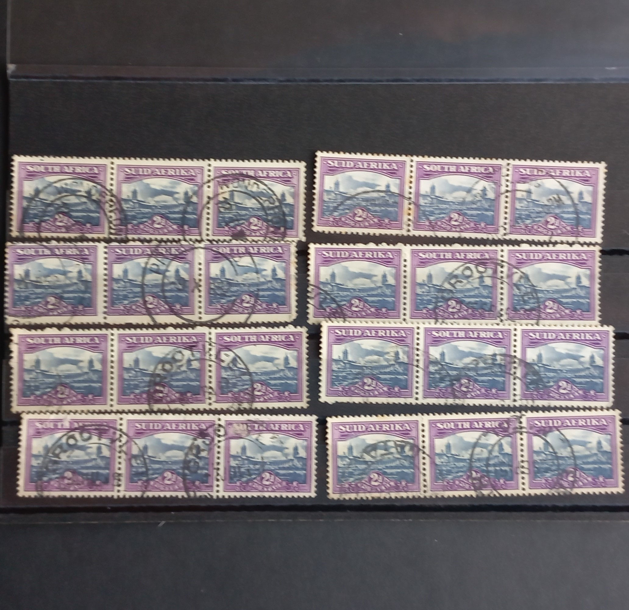 Lot #13 -Union - 1950 Reduced size - 2d - Selection of strips of Strips of 3